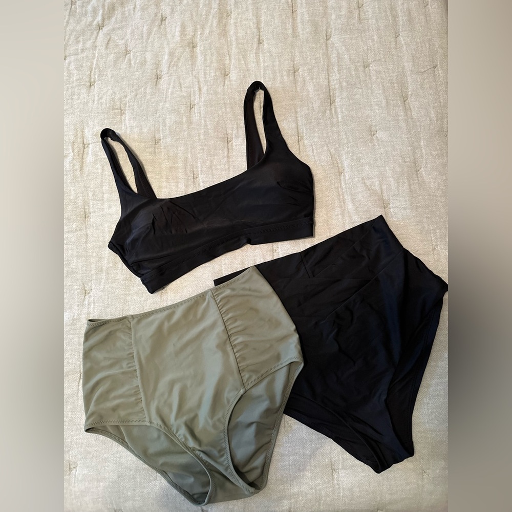 1 black swim top and 2 pair of high waisted bottoms.